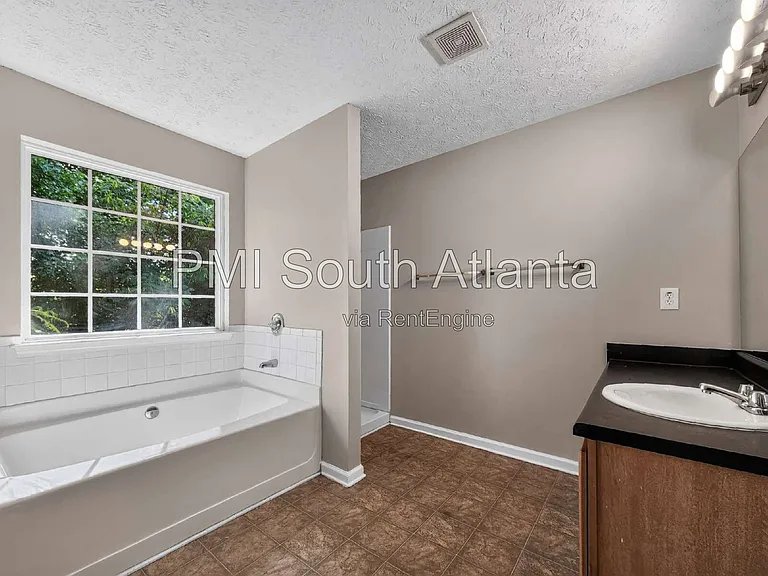 5722 Shoals Place Trl — Photo 39