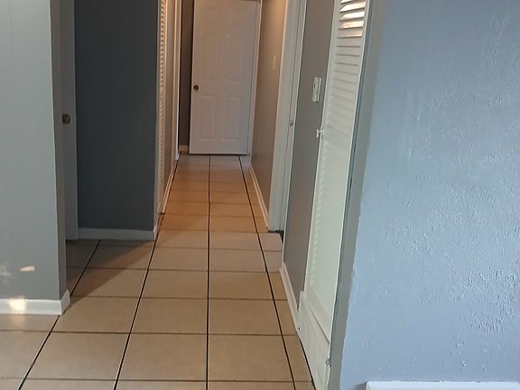 Hallway to bedrooms and bathrooms