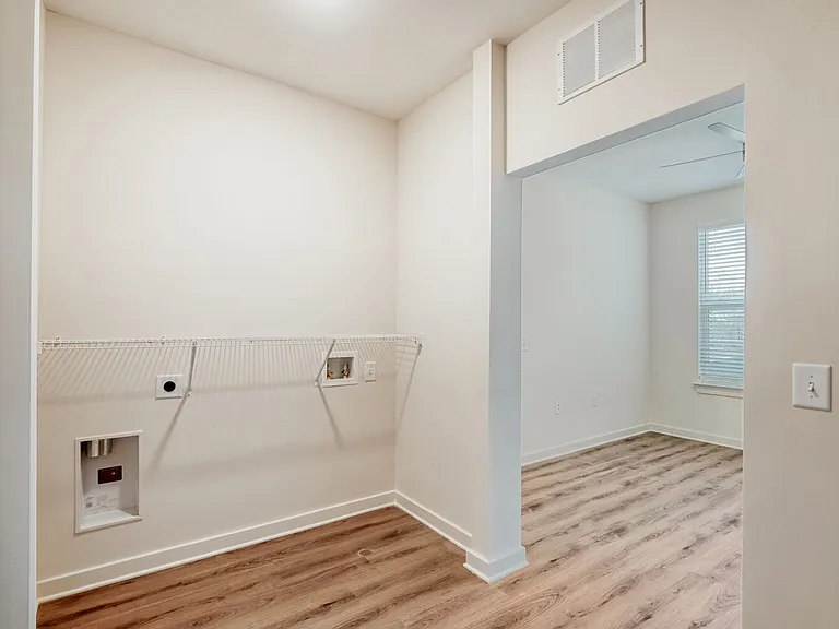 Unit Laundry Room with Washer/Dryer Hook Ups