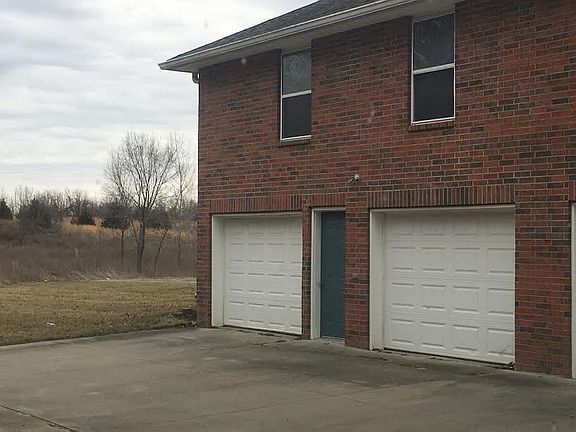 two car garage and garage entry for unit B, on the back of t