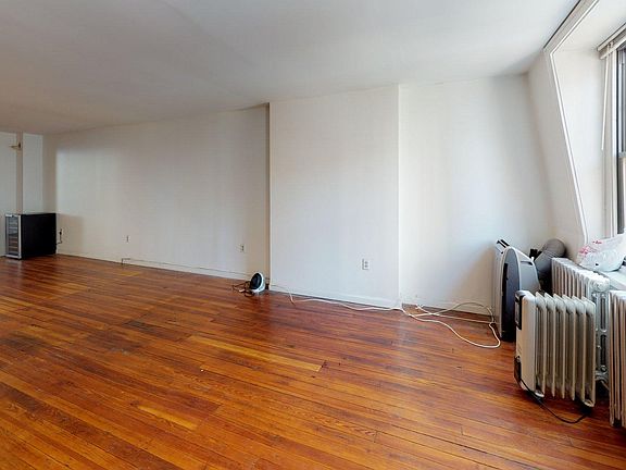 Open Living room kitchen eating area.