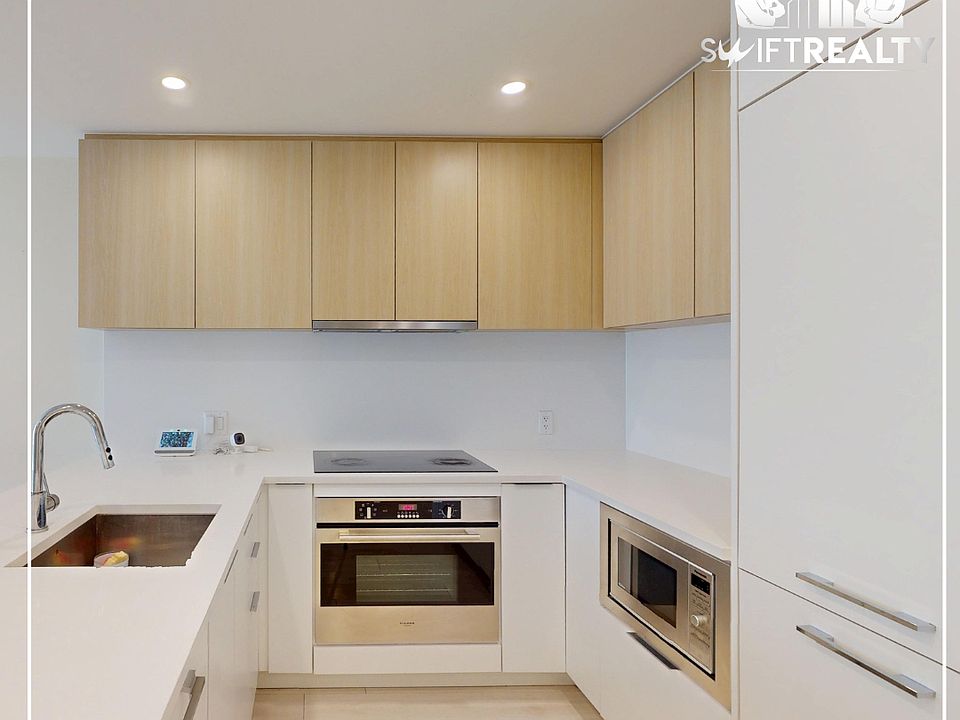 05_TH17-13318 104 Ave_Fully-equiped Kitchen_06272025