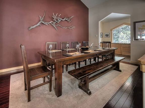 Modern dining area overlooking living room