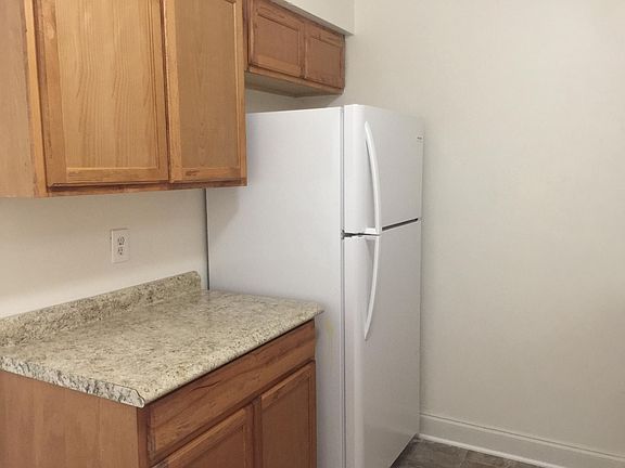 Kitchen; new cabinetry, countertops, paint and flooring.