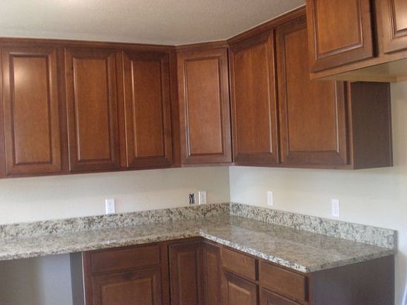 Kitchen w/ granite and new cabinets