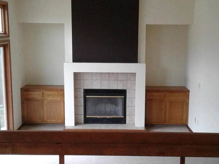 From dining room, see the beautiful fireplace and family room with sliding glass door.