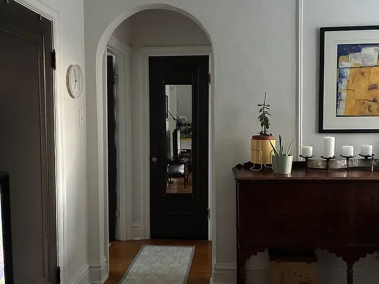 Hallway leading to bedroom and bathroom