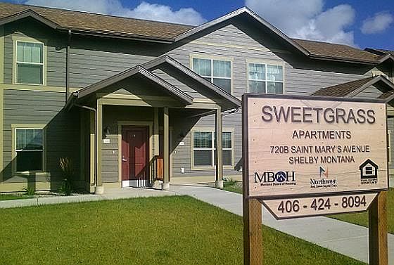 Apartment sign and building exterior