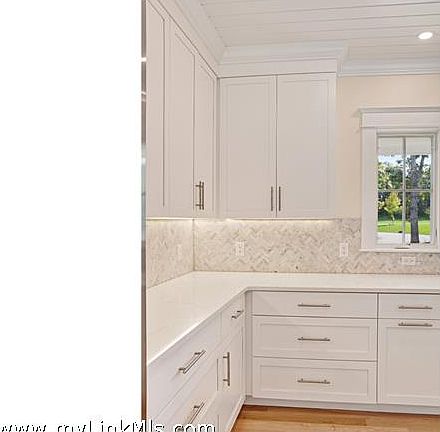 sample of kitchen cabinet/backsplash/countertop and shiplap ceiling