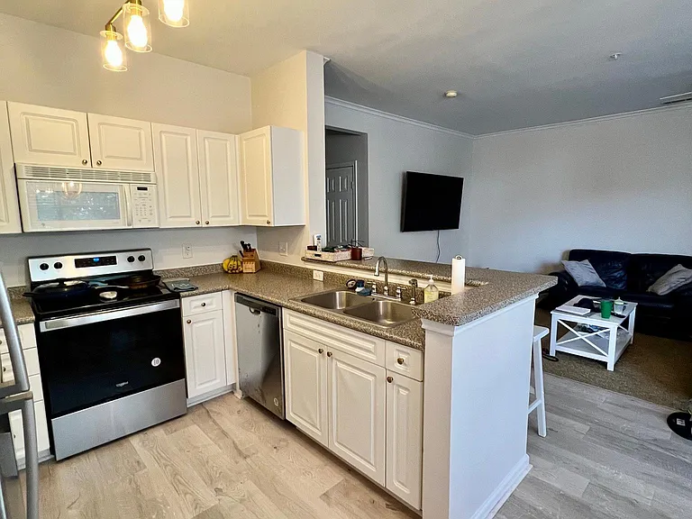 Kitchen into living room. Again all appliances have been updated.