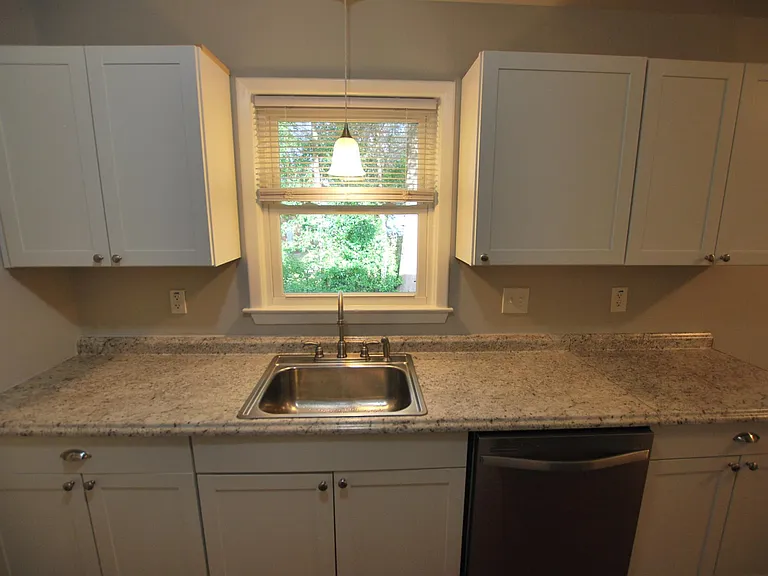 New Kitchen includes dishwasher and sink disposer