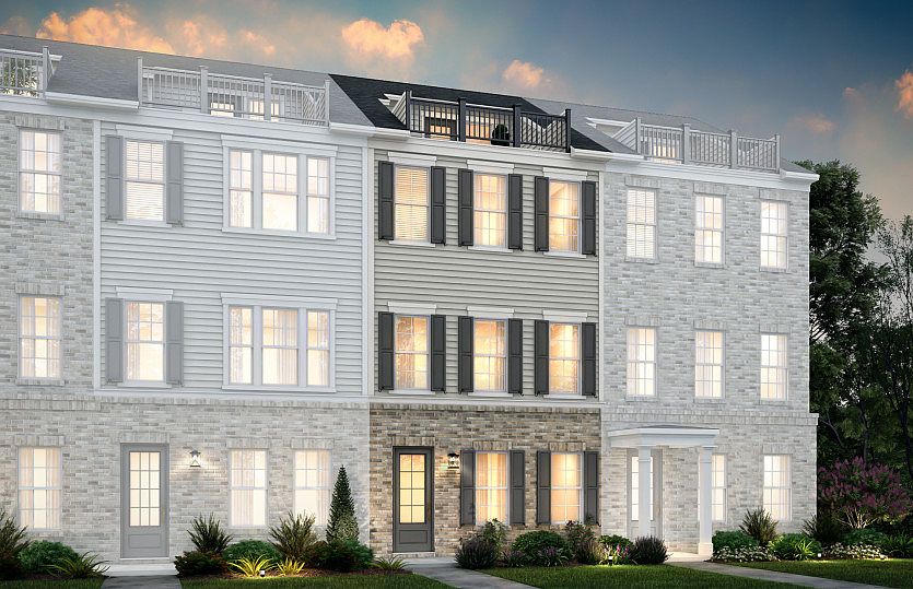 Broxton Exterior 75 features James Hardie TM siding, brick, terrace and 2 car rear load garage