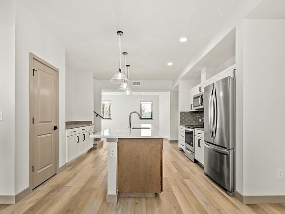 Full View of kitchen and bar area.