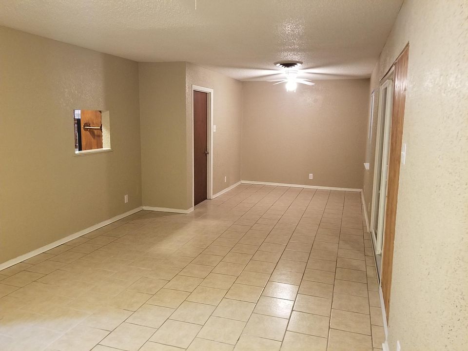 Living room has abundant space and marble connection to the