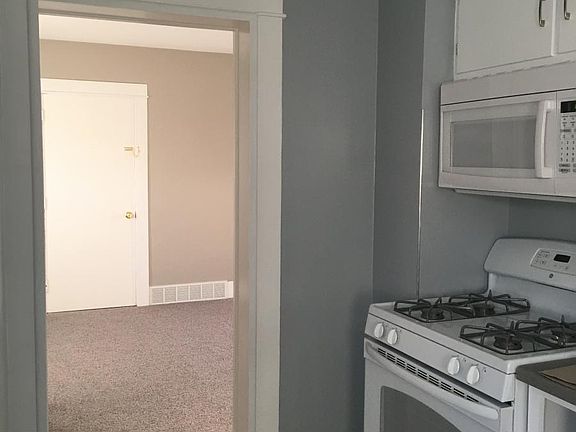 Updated kitchen with gas stove, built in microwave and refr