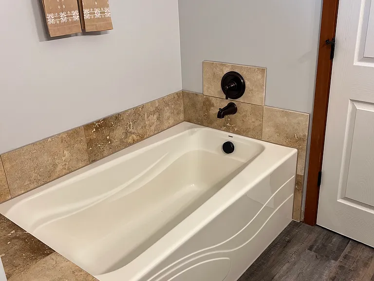 Primary bath soaking tub