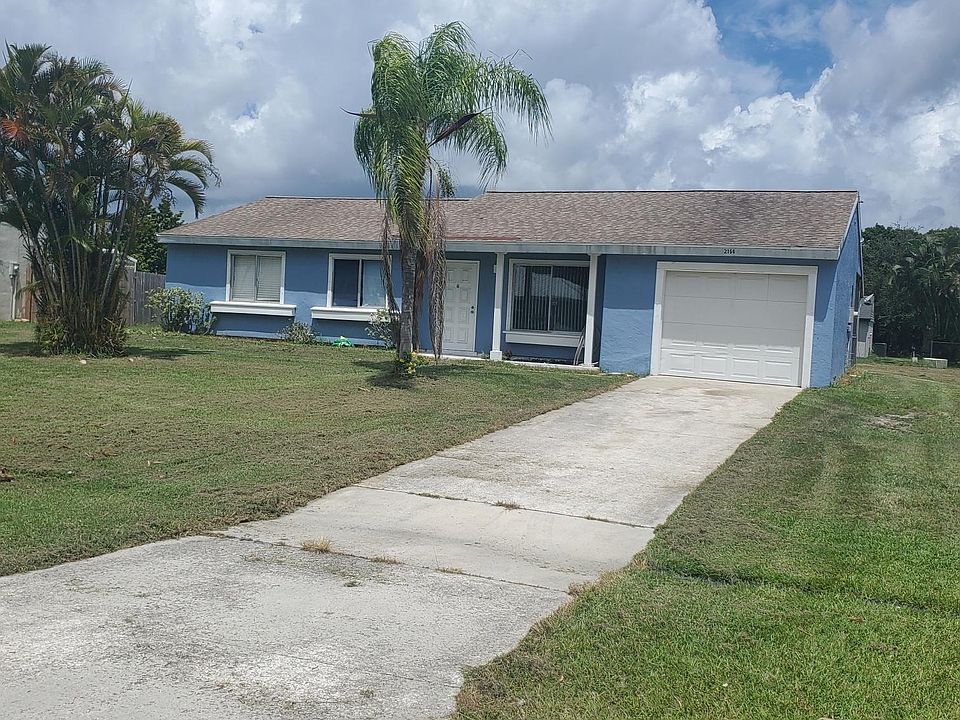 Front of house, one car garage with opener