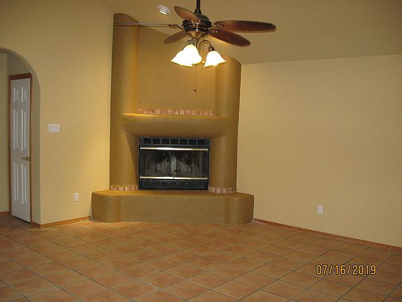 Living Room w/ wood burning fireplace