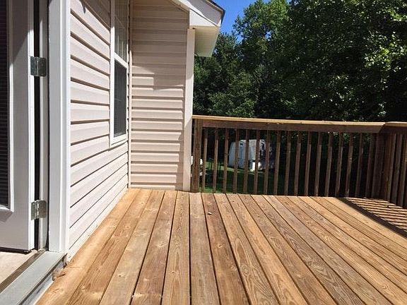 Backyard deck off of breakfast nook.