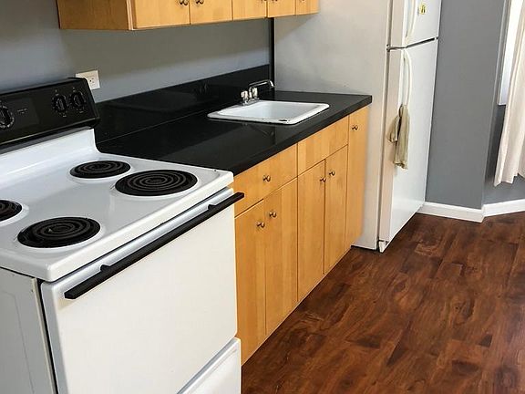 Full size appliances. Oven/range are electric. Portable dishwasher also available.