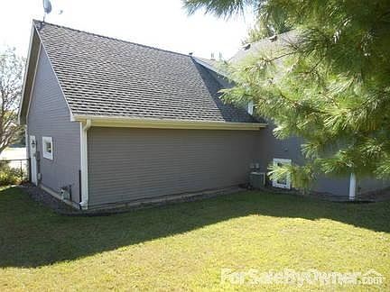 Backyard behind garage