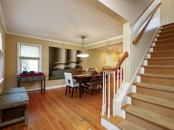 Entry Foyer w/Center Staircase - View to DR