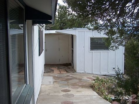 Separate Laundry room and Storage in Back