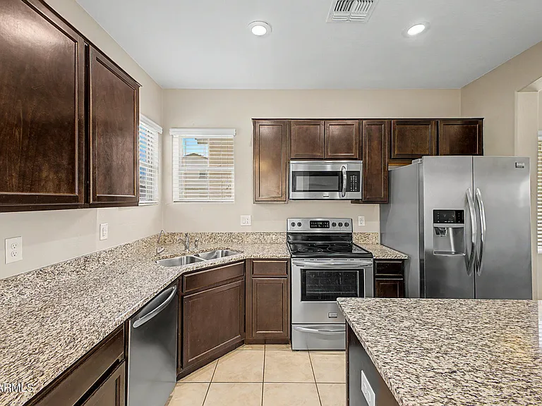 1947 N 77th Gln — Photo 2