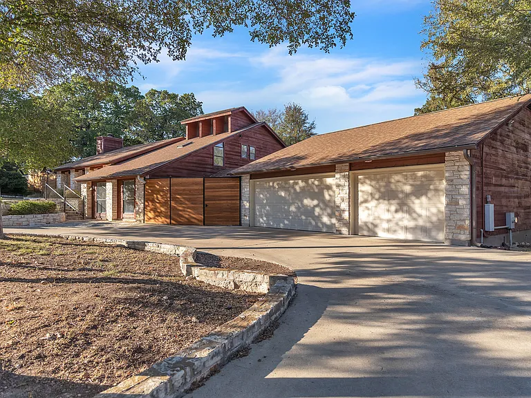 Front View with the 3 car Garage View and Circular Driveway