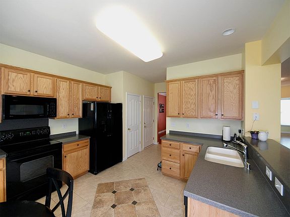 Kitchen w/ custom tile floor