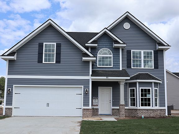 Elevation A featuring optional brick skirt