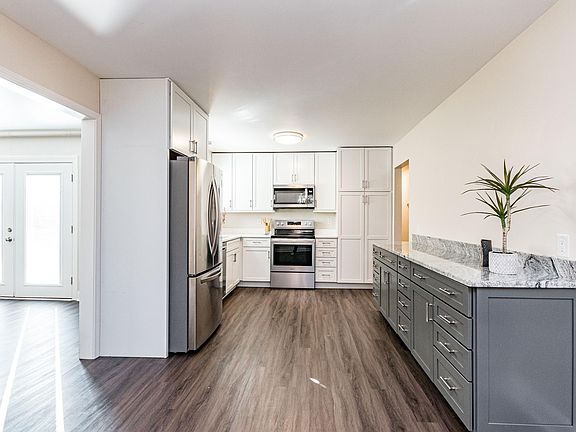 Expansive Kitchen With Abundance of Counter Space And Storage