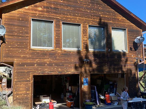 Living room above 2 car garage.