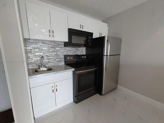 4th image of 8260 SW 210th St APT 215
