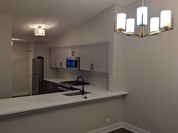 Spacious kitchen with new appliances