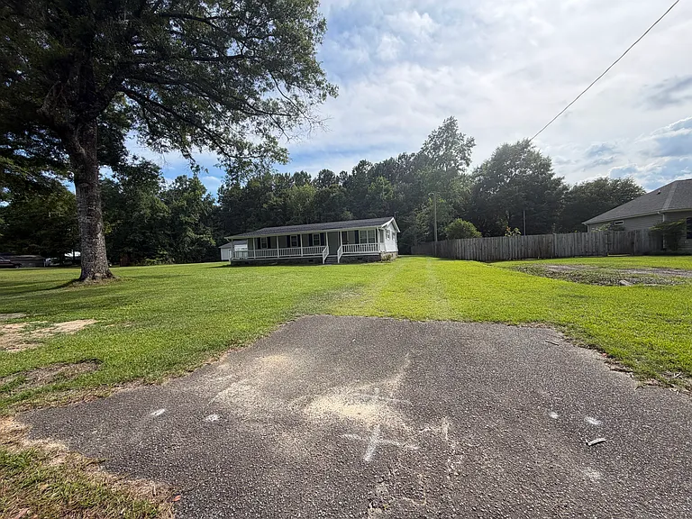 large .69 acre lot. No HOA. no fence. Detached garage not included.