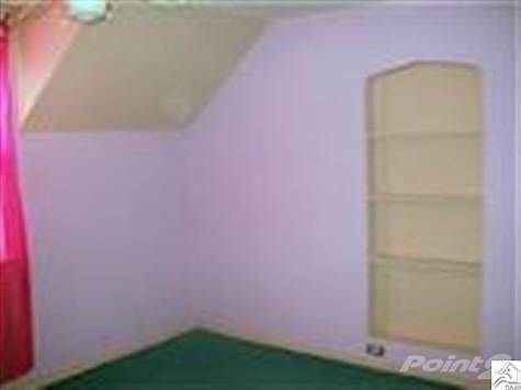 Note the built-in shelving