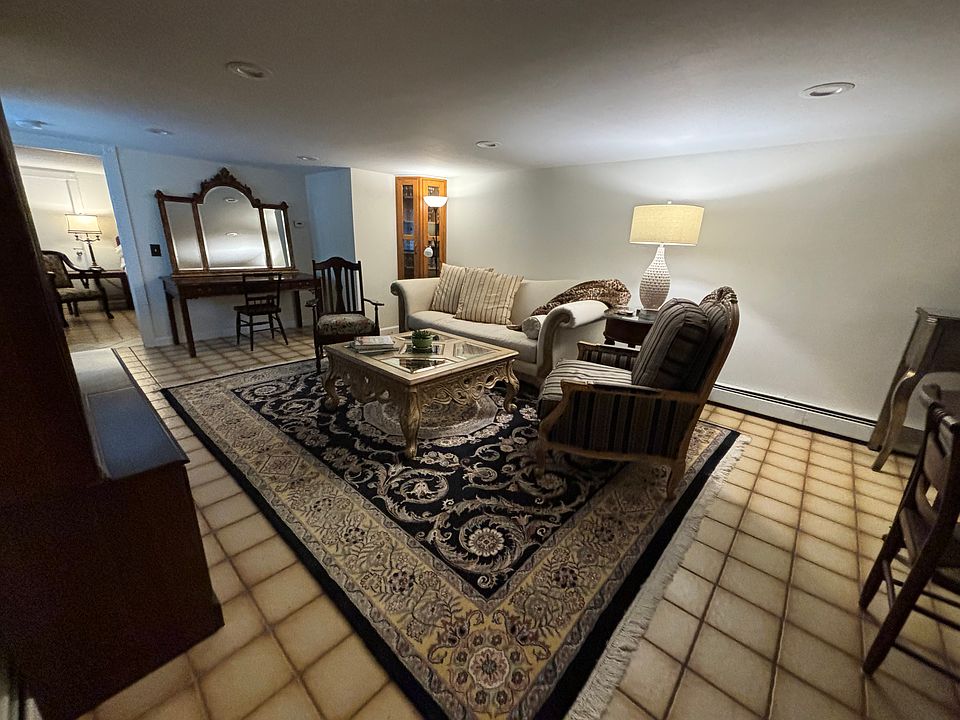 Living Room Area with view into Bedroom