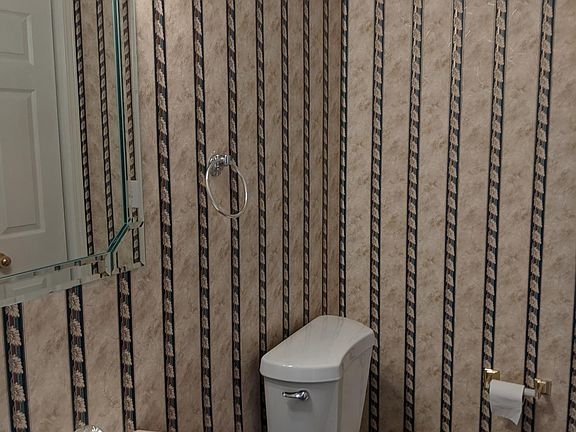 1/2 bath with storage closet