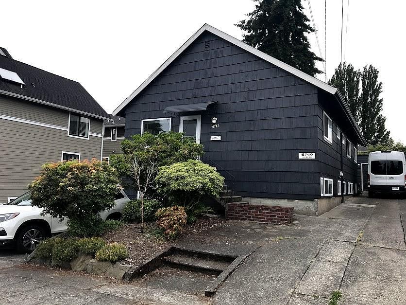 Front door with parking space on left.