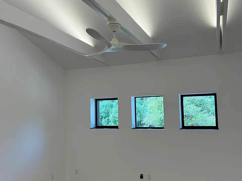 West elevation and beams with uplighting