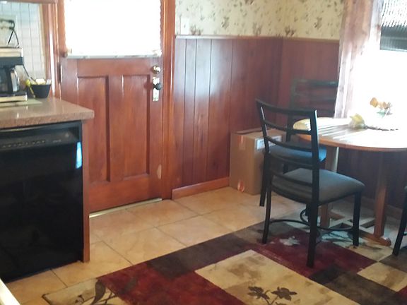 Kitchen with beautiful maple cabinets and refrigerator, micr