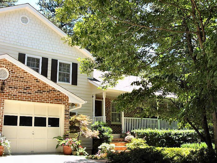 Huge 4/3.5 Updated Split Level on .75 Acre Wooded, Landscaped & Private Lot.