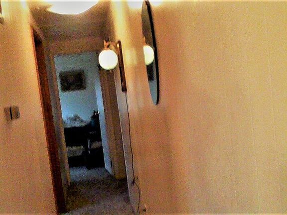 off kitchen hall to bed room