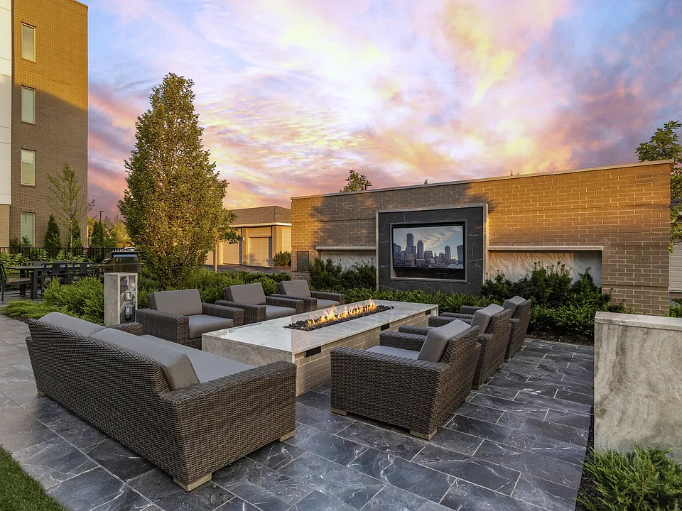 Outdoor lounge complete with grilling stations and cozy seating areas