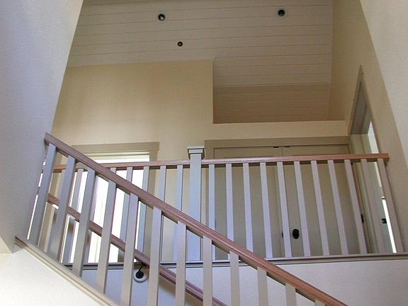 Balcony overlooks Two-Story Entry