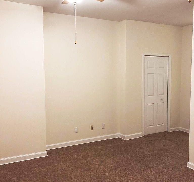 Livingroom. Laundry is behind the doors pictured. There is another closet in this room for coats/storage (not pictured, see floor plan).