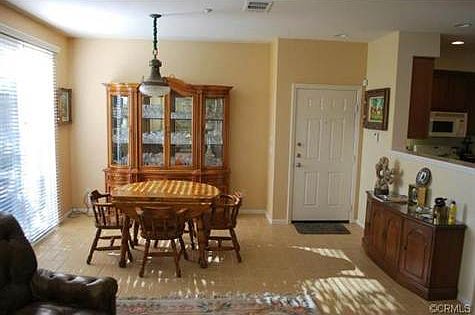 Sliding door on left in this picture leads out to brick-paver pa