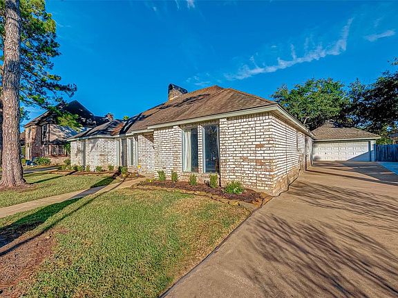 Long driveway to accommodate parking. Seller recently widened the drive at the detached garage