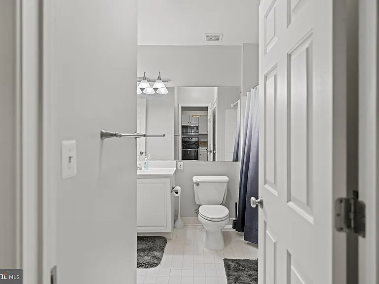 7011 Falls Reach Dr #103 — Photo 23